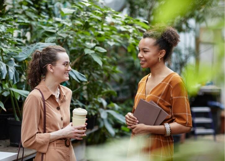 two young ladies in consultation